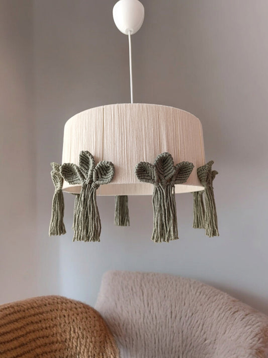“Green flower macrame chandelier for nursery room - handmade boho pendant light with cotton tassels and adjustable cord”