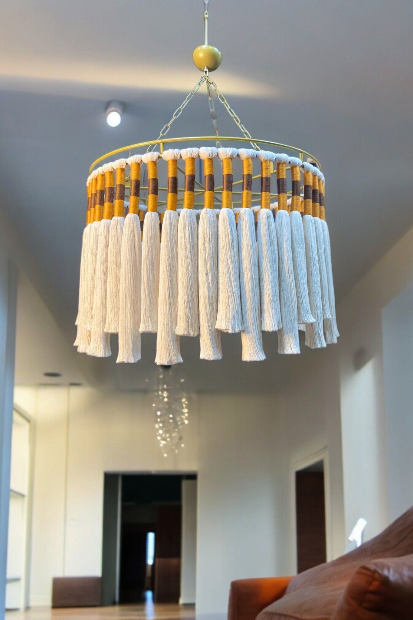 Large cotton macrame chandelier, Diameter and colors are suitable for personalization. Ideal for the living room, it will add a bohemian and stylish atmosphere to the sitting area. Diameter 60 cm, height 45 cm. Works with 3 bulbs.