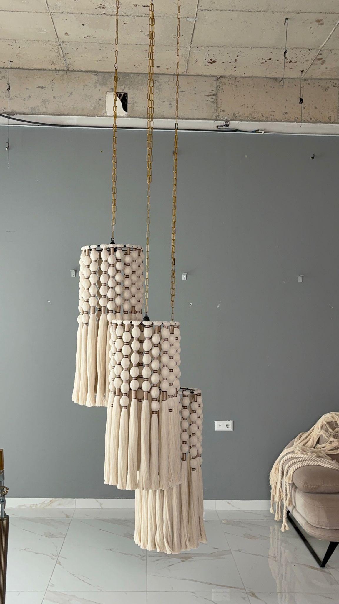cord knitted with cotton yarn, single-connected 3-lamp pendant lamp, brass plate, beaded cord.