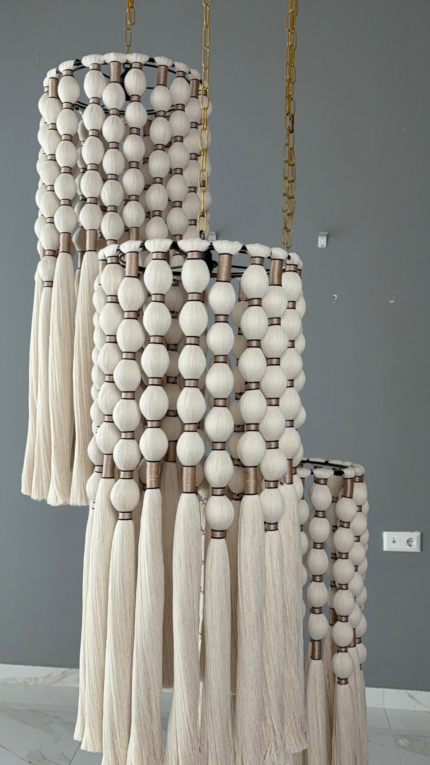 cord knitted with cotton yarn, single-connected 3-lamp pendant lamp, brass plate, beaded cord.