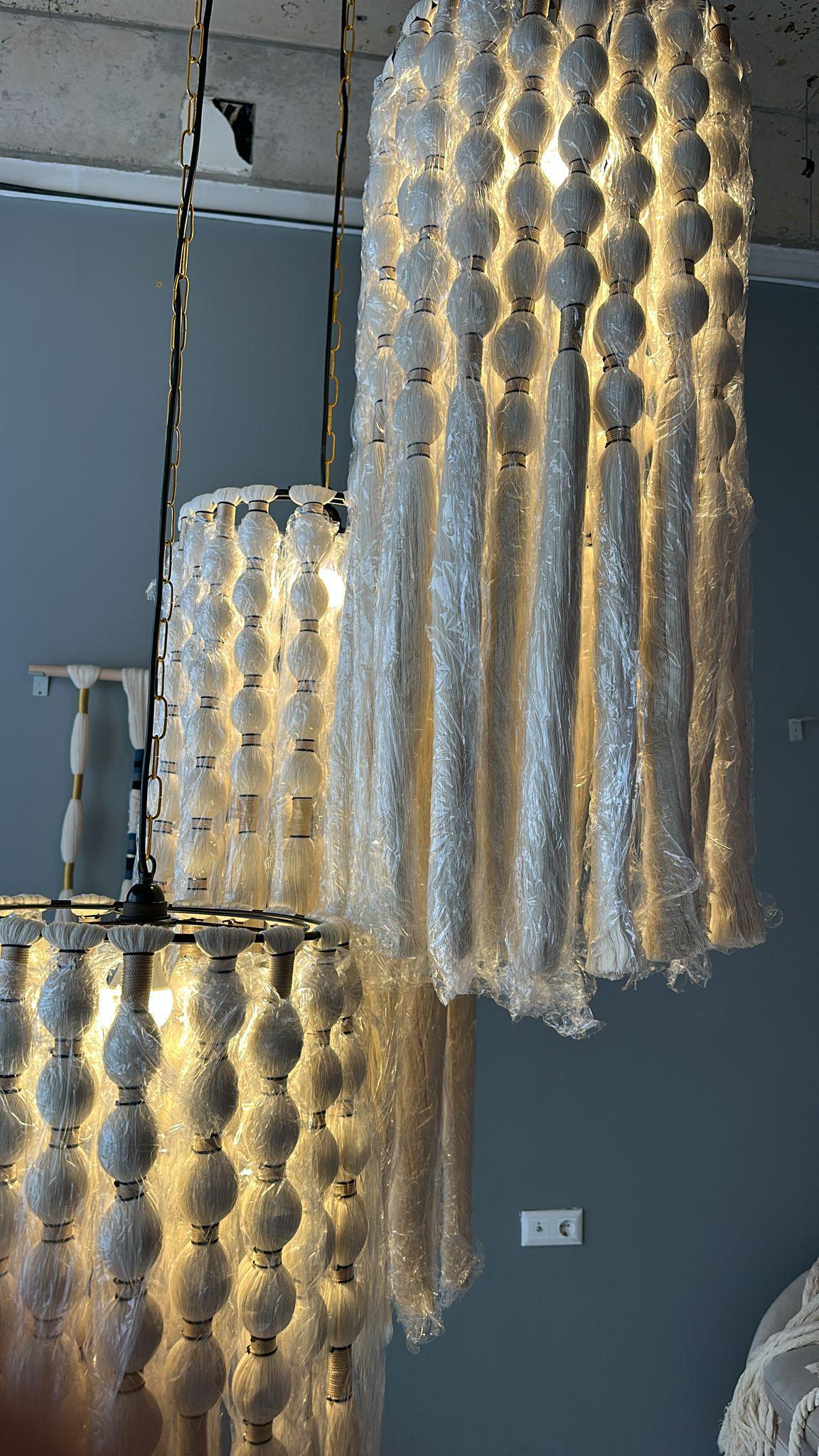 cord knitted with cotton yarn, single-connected 3-lamp pendant lamp, brass plate, beaded cord.