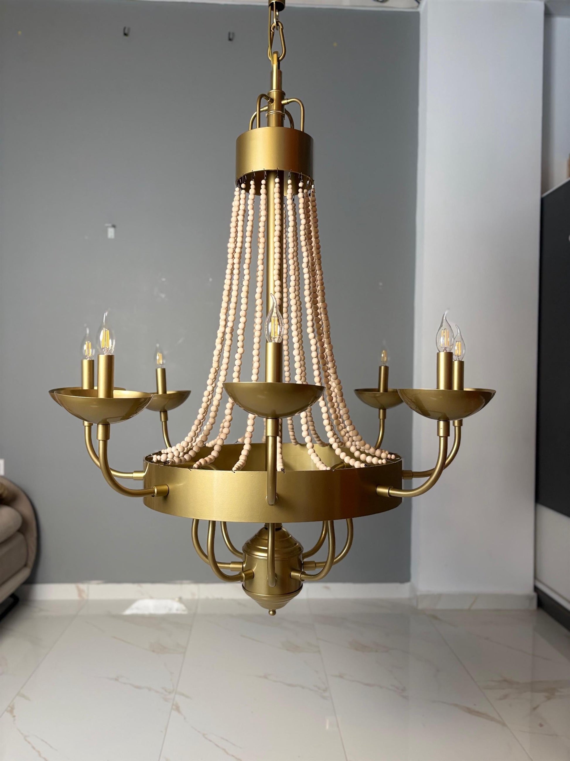 Gold beaded candle chandelier with natural wood beads and E14 candle bulbs”
Black metal candle chandelier with wood bead drapes”
White beaded chandelier for rustic modern dining room”
Handmade large candle chandelier holiday home lighting”